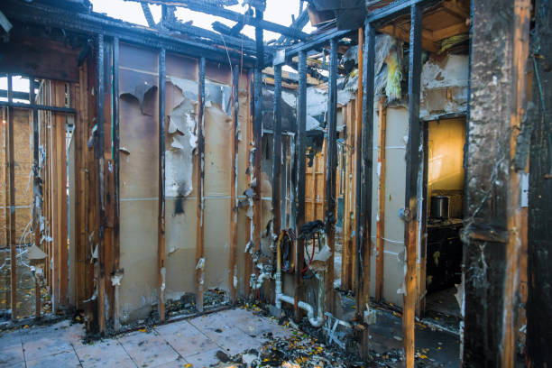 Professional Emergency Fire Damage Restoration technician working in Le Sueur, MN